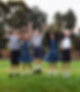 This image links to the Saint Nicholas Catholic School Tuition, Fees and Assistance Page. It depicts a group of Saint Nicholas School elementary school students, both boys and girls, jumping in the air on one of the Saint Nicholas School fields at recess. Saint Nicholas school is located in Los Altos Hills California