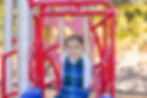 This image links to the Ways to Give page on the Saint Nicholas Catholic School Website. It depicts a kindergartener playing on the playground.